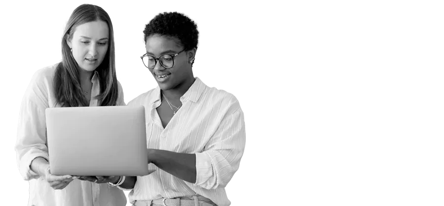 work colleagues looking at data on a laptop