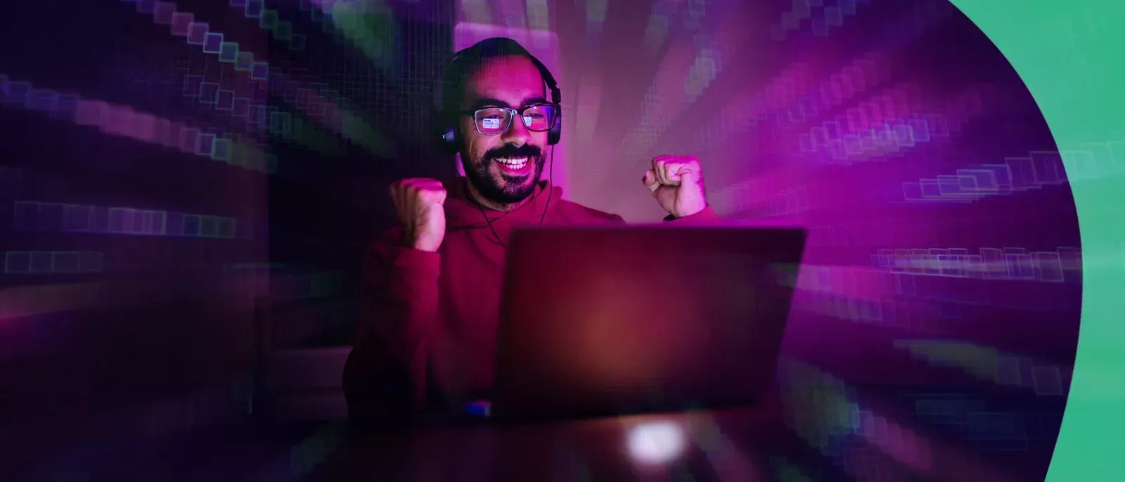 Man raising hands in Victory as he plays online games.