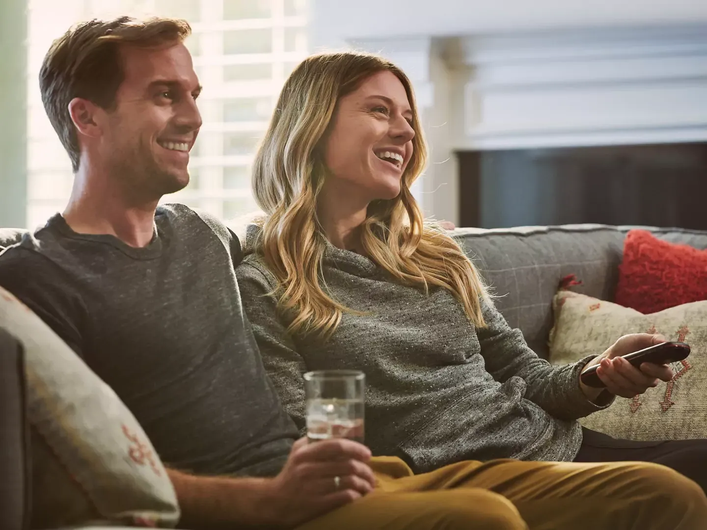 People enjoying the latest shows on their tv with dish.