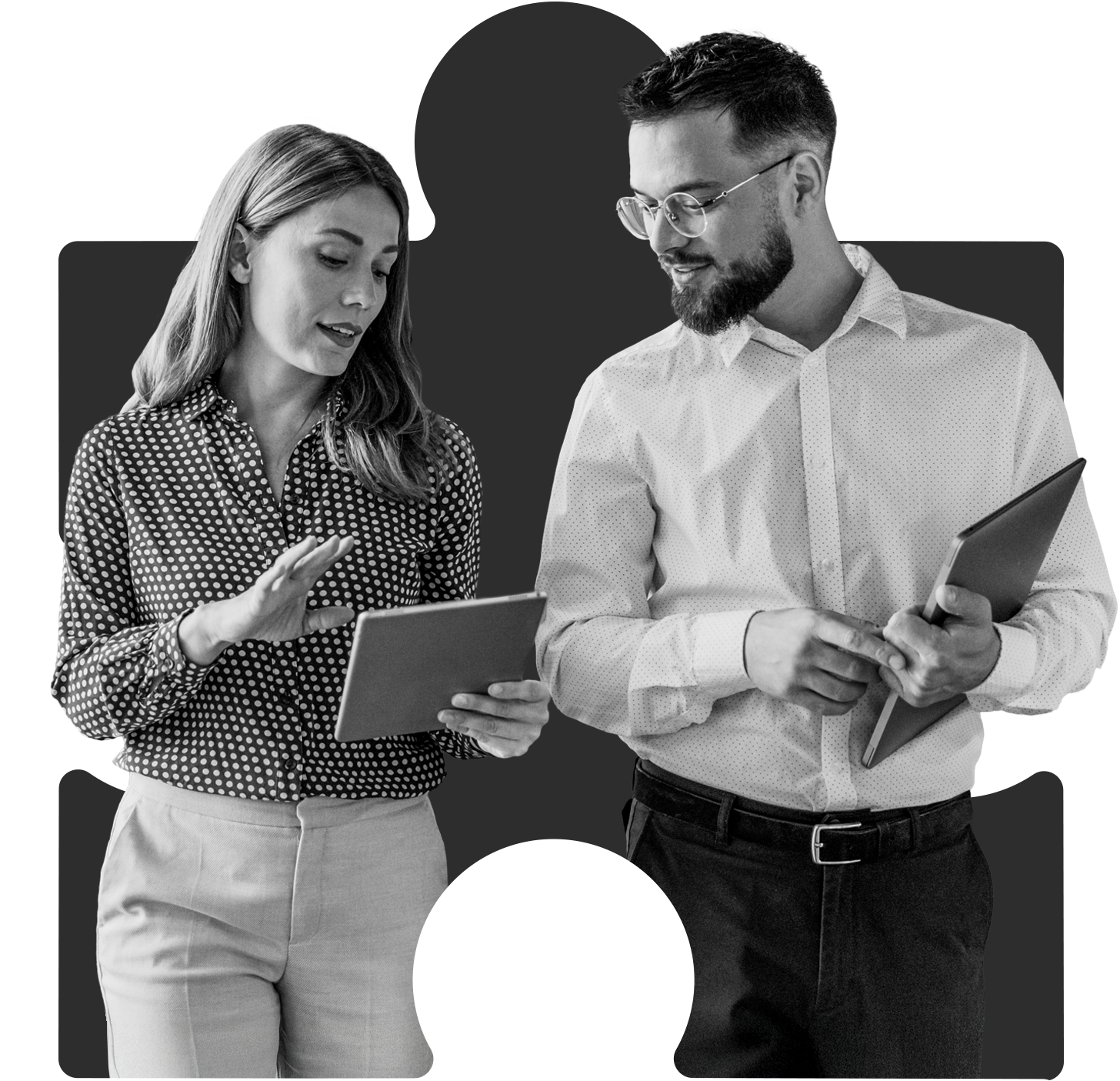 woman and man looking at a tablet