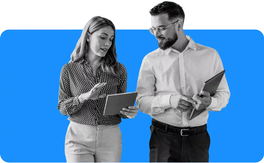 woman and man looking at a tablet