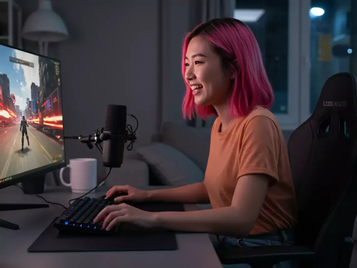 Woman with pink hair games at home