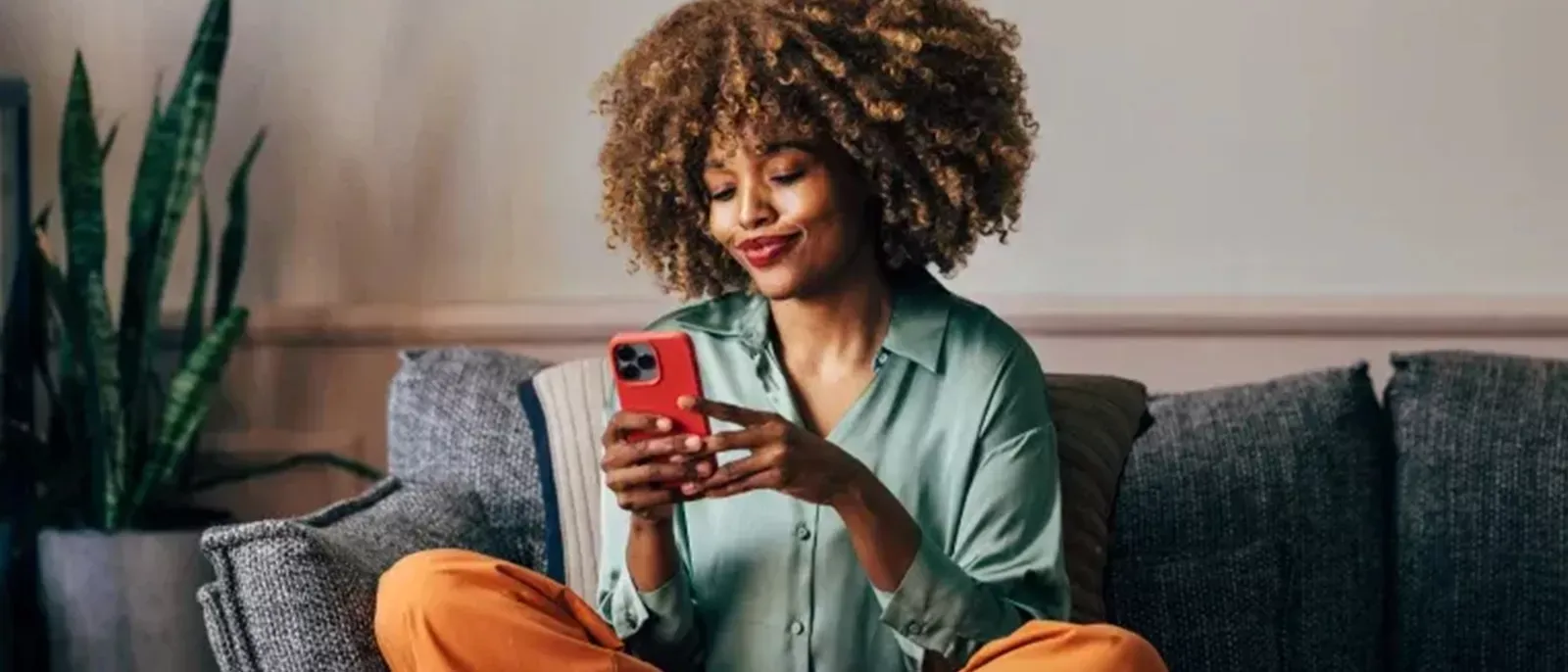 Woman transfers DVR recordings to mobile device