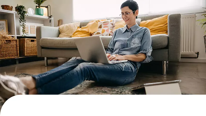woman with laptop and digital tablet