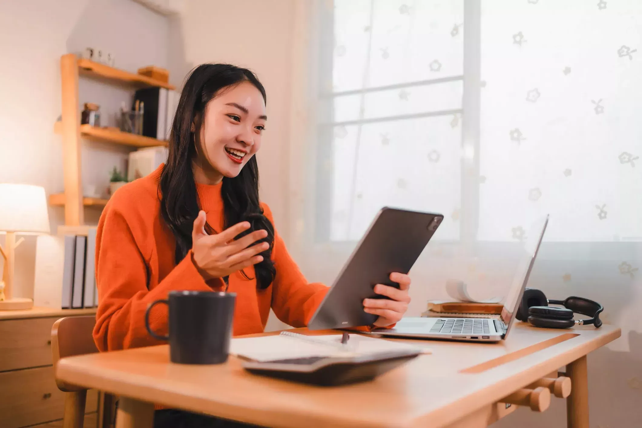 Happy woman works from home with fiber internet