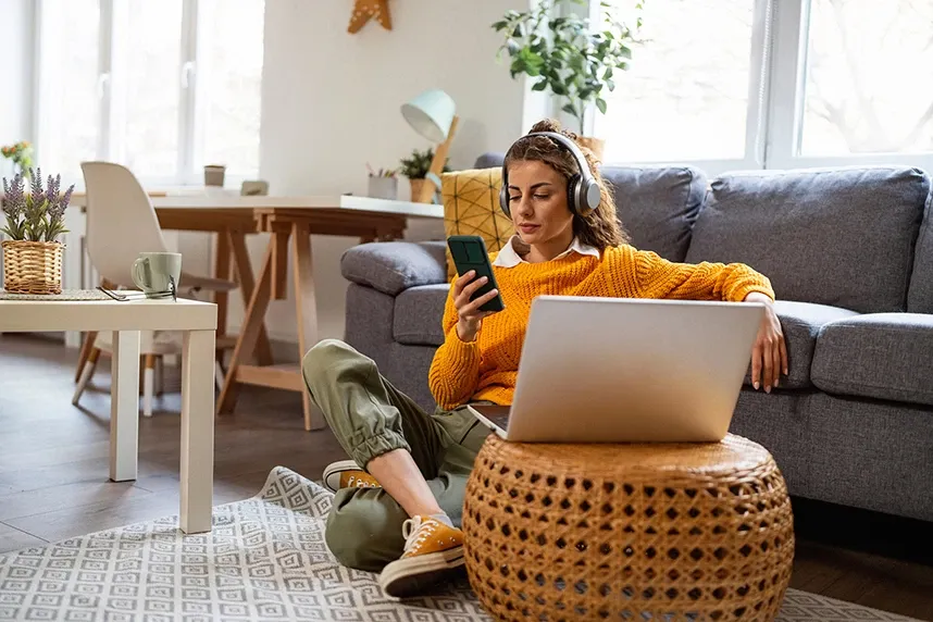 woman using phone to check social media