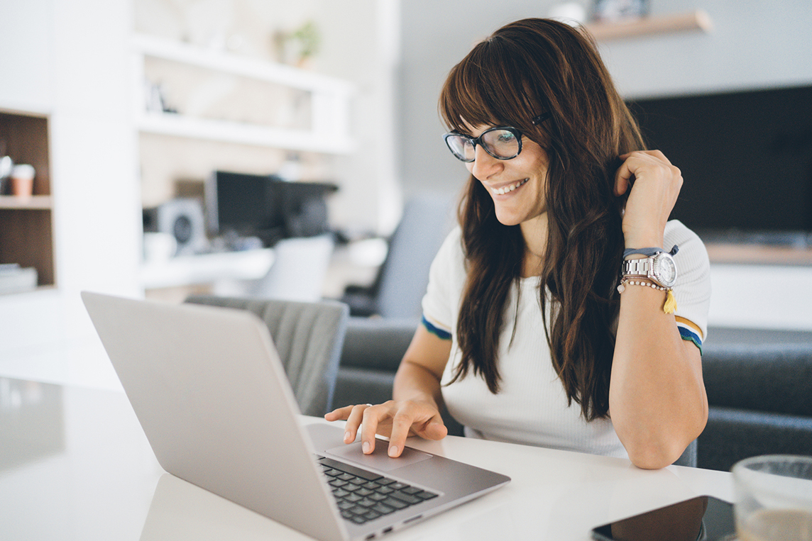 woman working from home with at&t internet