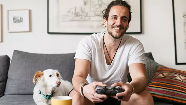 young adult male playing video games