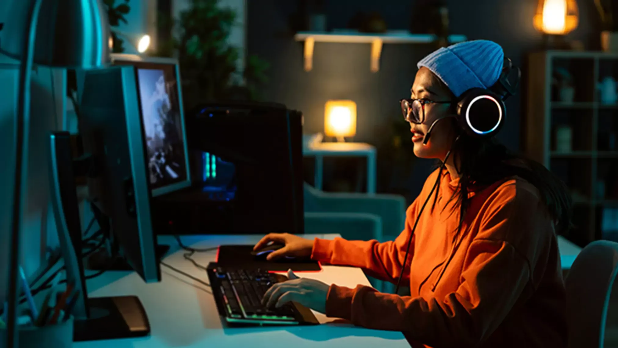 young woman playing video games at home