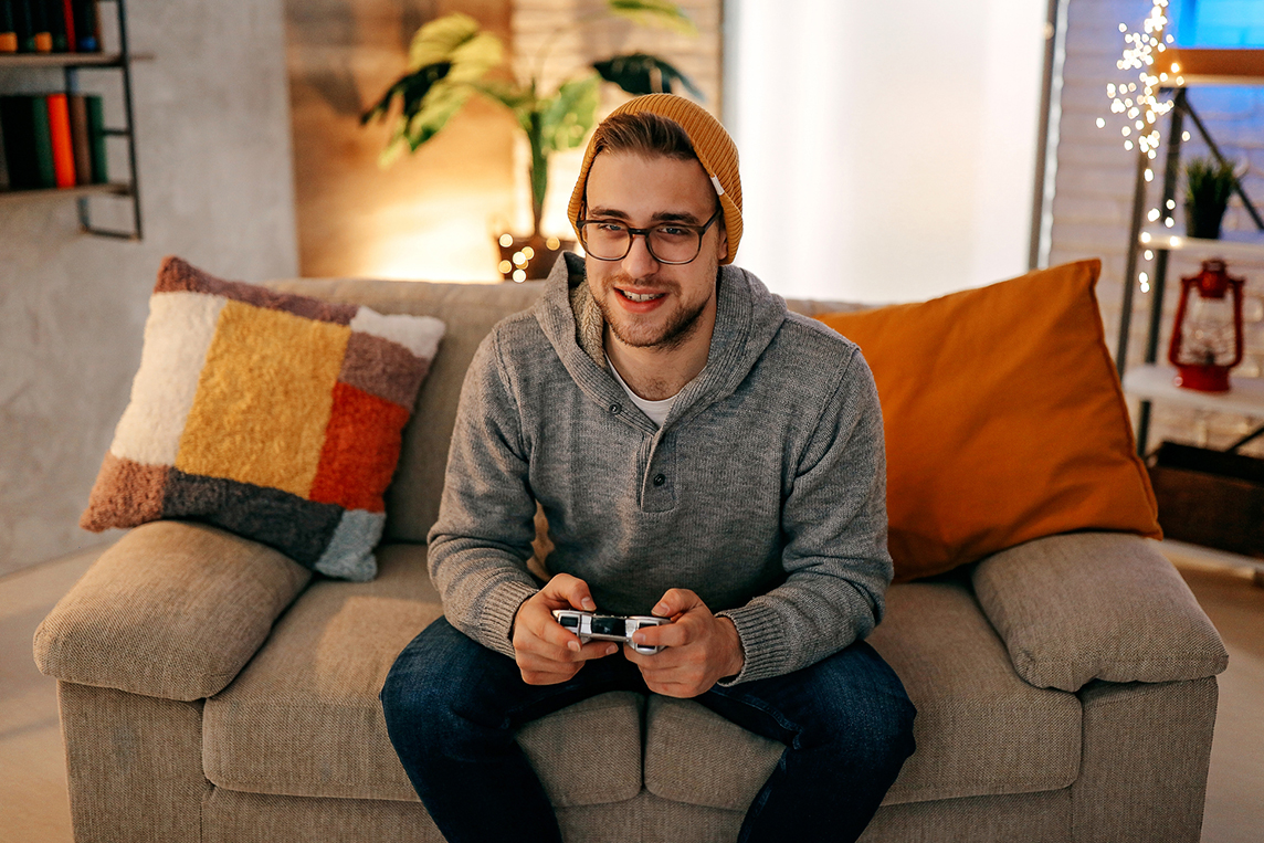young man playing a video game
